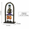 Set of three handcrafted Rajasthani-style metal figurine wall decor panels with colorful traditional attire, displayed on a table and mounted on a wall.