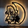 Black metal Hanuman wall art featuring Lord Hanuman’s face and circular design, displayed with dimensions