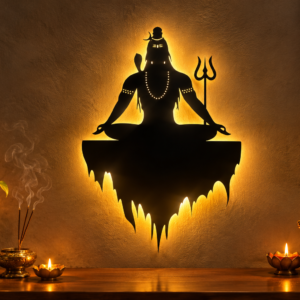 Black metal Lord Shiva meditation wall art with warm LED backlighting, trishul design, and traditional Indian décor with diyas and incense.